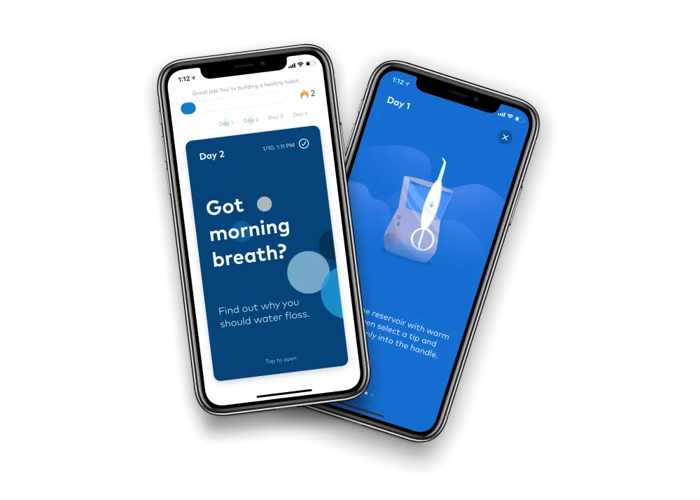 Two iPhones with the Waterpik 14-Day Challenge app